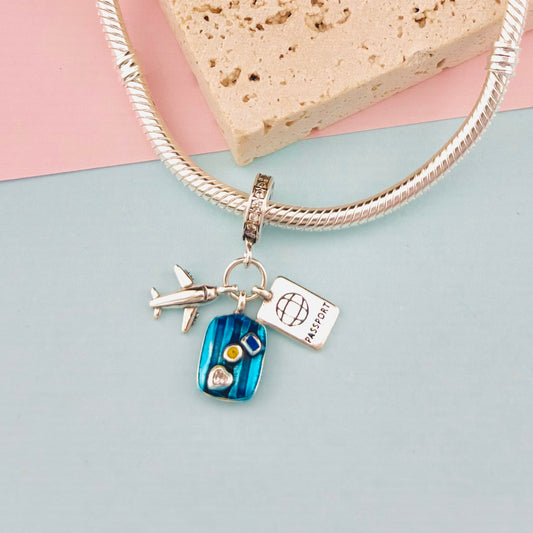 CHARM VIAJERO AZUL